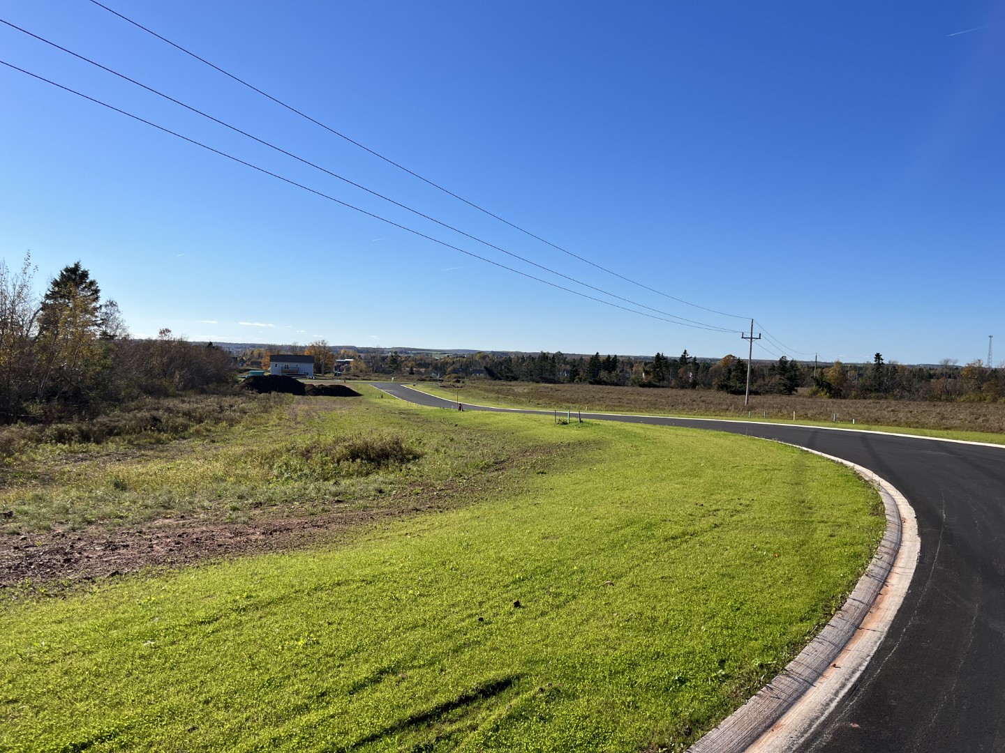 Windsor Park curved paved road with ready to build lots on both side.
