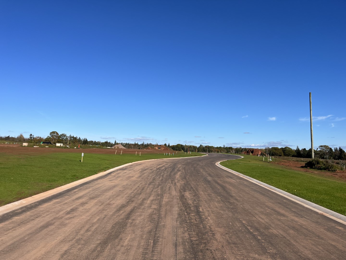 Woodland Creek paved road ready for new homes.